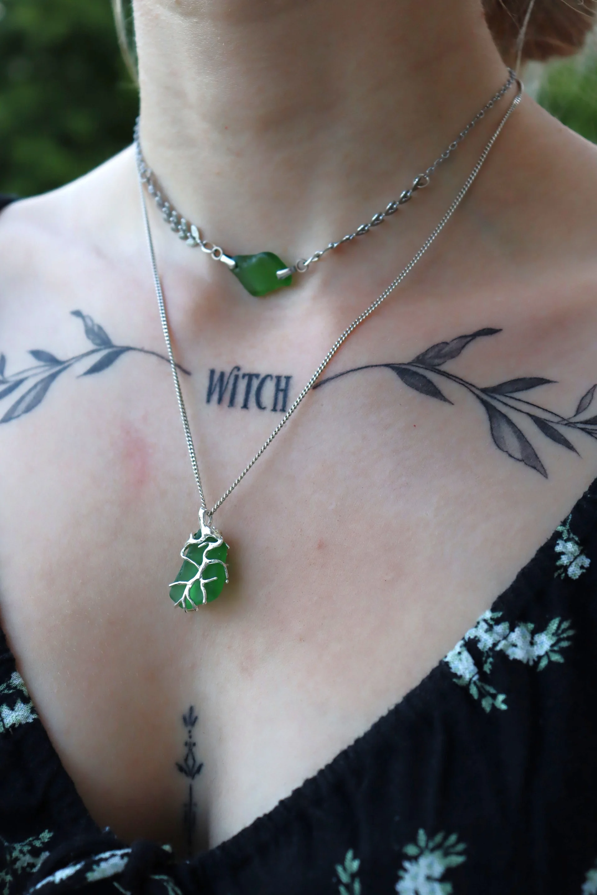 Corallia pendant, green sea glass set in silver-tone coral